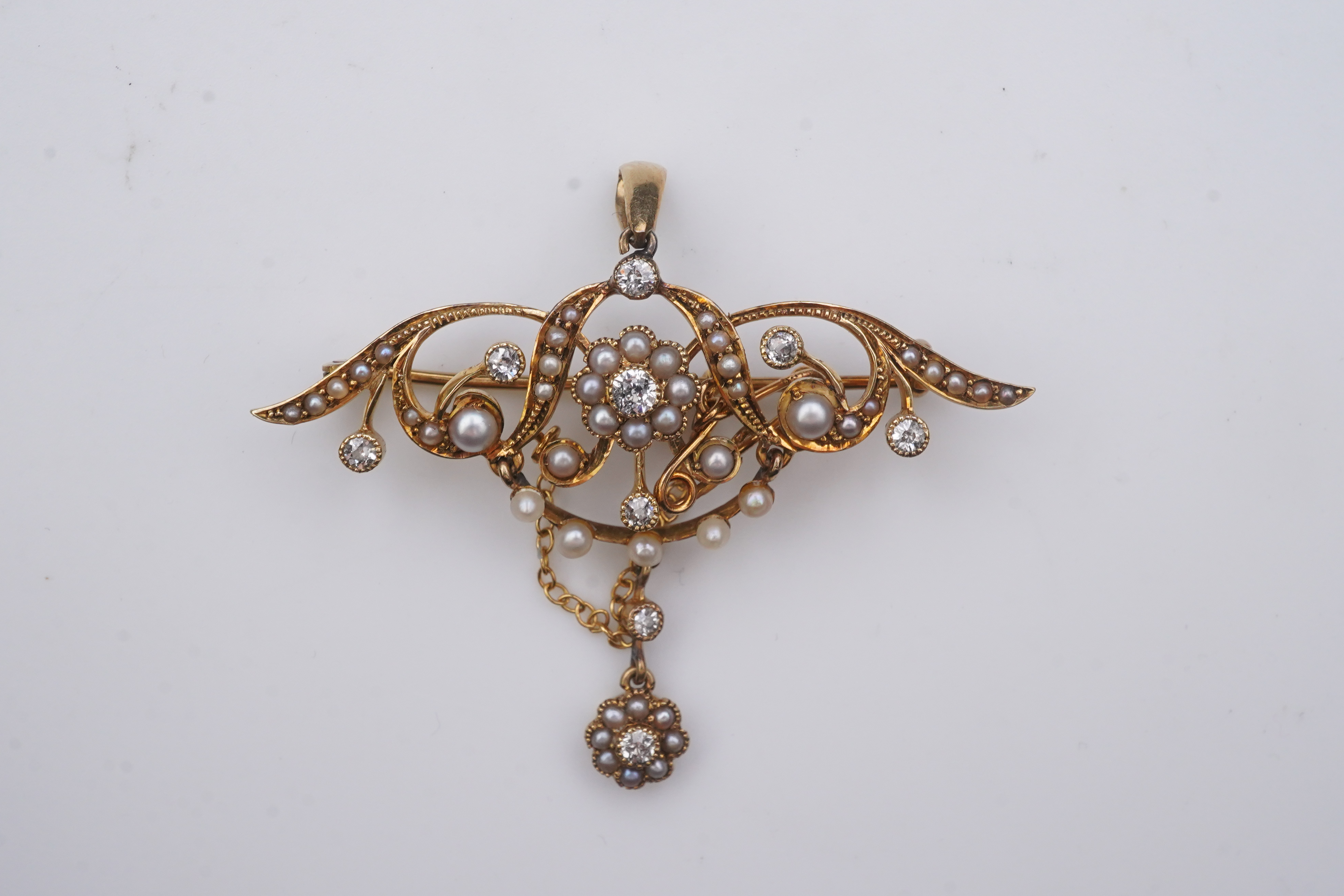 An Edwardian seed pearl and diamond brooch, early 20th century